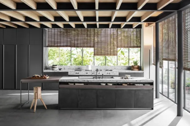 Design kitchen with island VVD in railway steel and top in Molteni & C Ceppo stone.