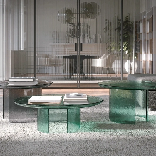 Atollo coffee table in hammered glass by Tonin Casa.