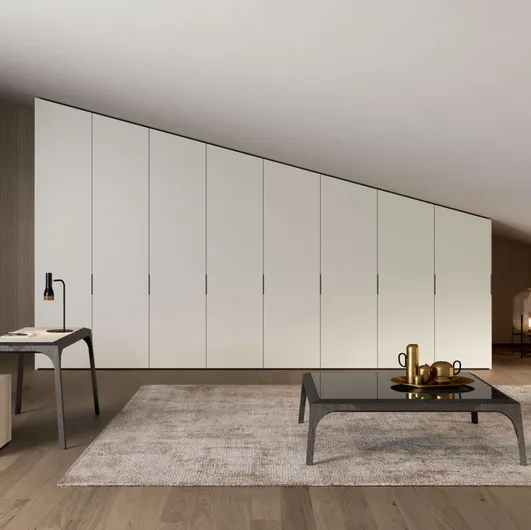 Custom-made wardrobe with swinging doors for attic spaces by Presotto