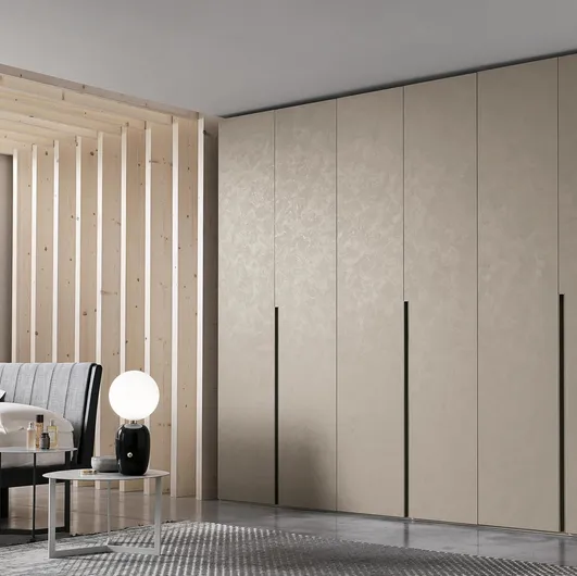 Wardrobe with swing door Doris in cement-look finish by Tomasella.