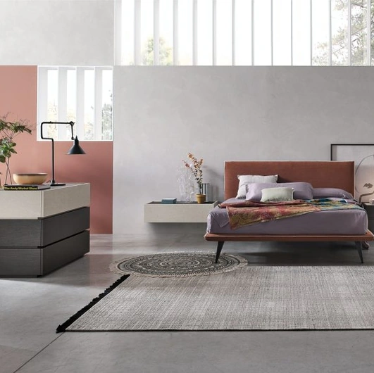 Bravo bed with fabric headboard by Tomasella