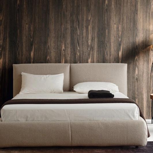 Magenta upholstered bed with storage by Calligaris.