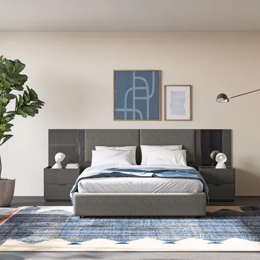 Eclectic bed EN01 in upholstered fabric and glass by Colombini Casa.