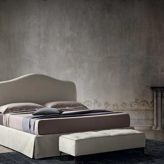 Fabric bed with shaped headboard Damian by Felis.