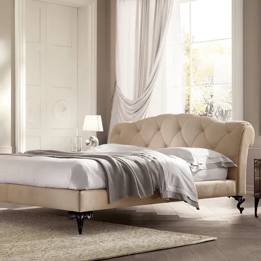 Bed with padded and quilted headboard George by Cantori.