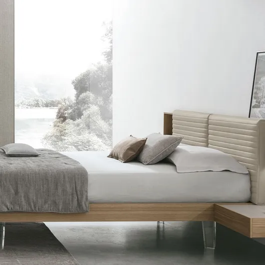 Yuki bed in walnut material with faux leather headboard by Tomasella.