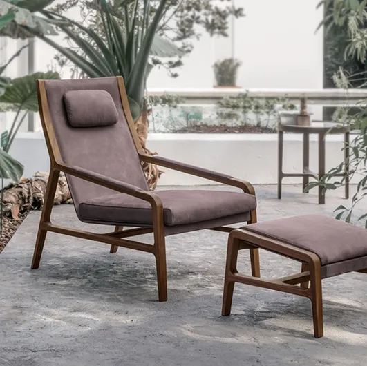 Leather armchair with solid Walnut frame Margot Relax by Alivar.