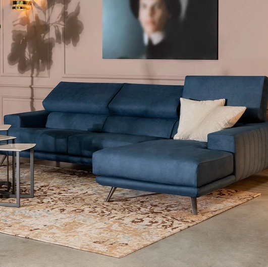 Leather sofa with chaise, reclining backrest and headrest Sebastian by Tonin Casa.