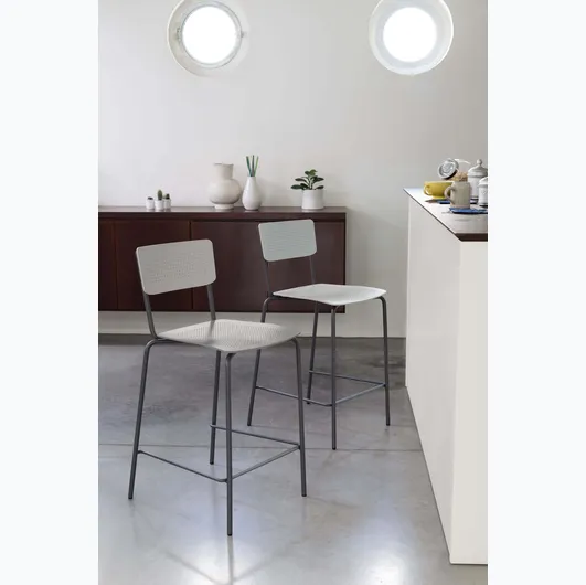 Stackable College stool in polypropylene with lacquered steel base by Ingenia