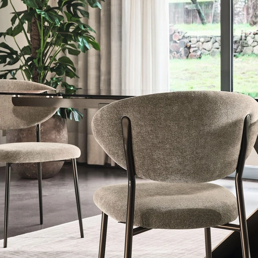 Manta upholstered fabric chair by Calligaris