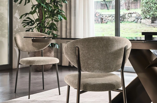 Manta upholstered fabric chair by Calligaris