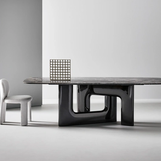 Liaison design table with marble top and polyurethane base by Bonaldo