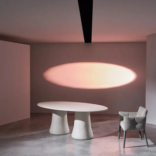 Oval table Mae 34 in spattered clay at the base by Gervasoni.