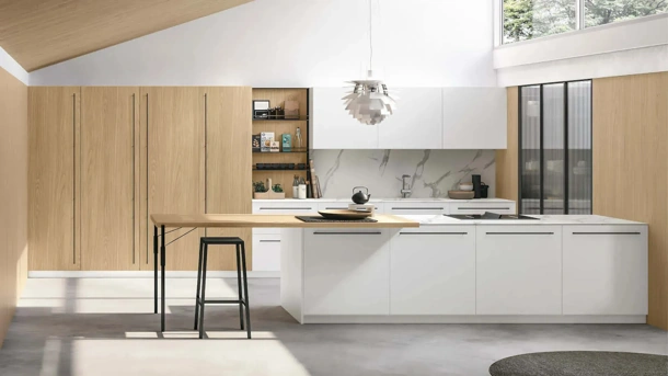 Modern Kitchen with Metropolis 06 Peninsula in White PET and Sun Oak by Stosa