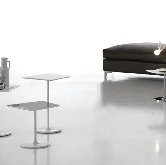 Bloom coffee tables in lacquered acrylic stone with a steel base by Alivar.