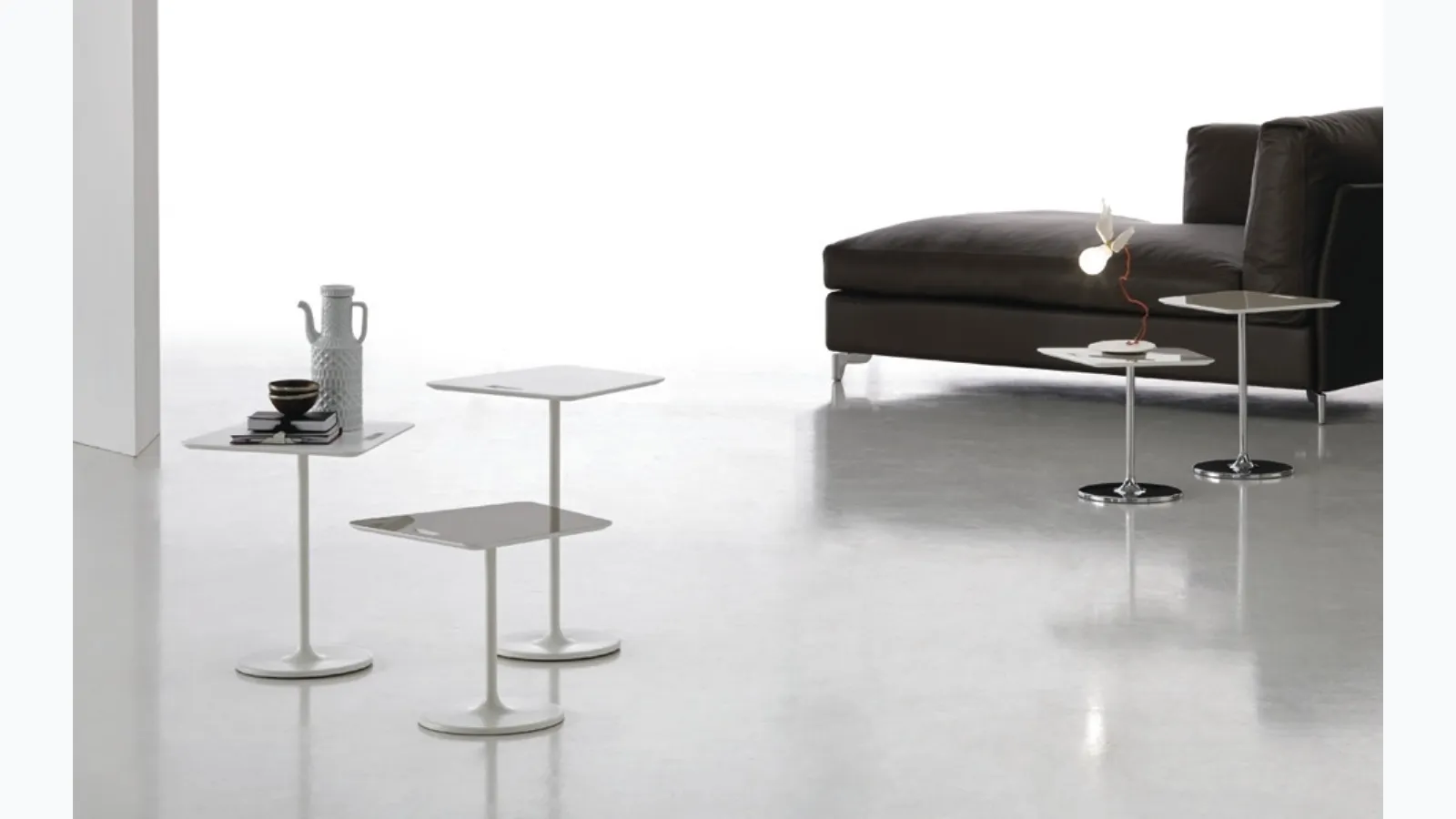 Bloom coffee tables in lacquered acrylic stone with a steel base by Alivar.