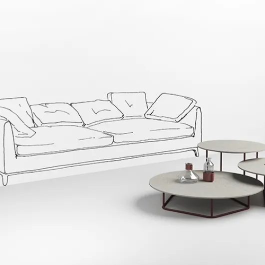 Tables with white concrete top Circus by Minotti Italia.