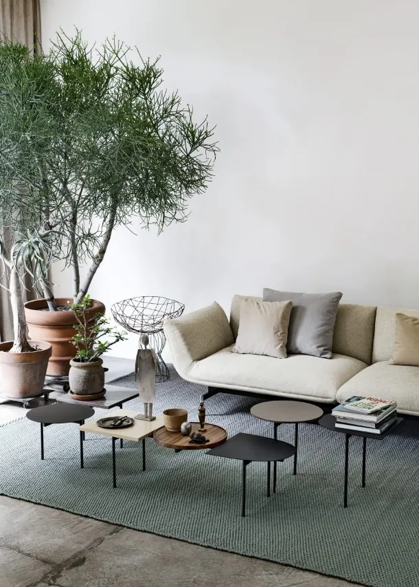 Constellations tables in lacquered wood with a metal structure by Kristalia.