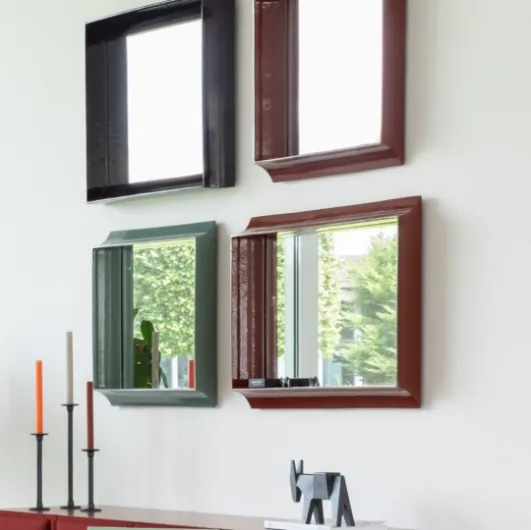 Coves mirror with ceramic frame by Magis.