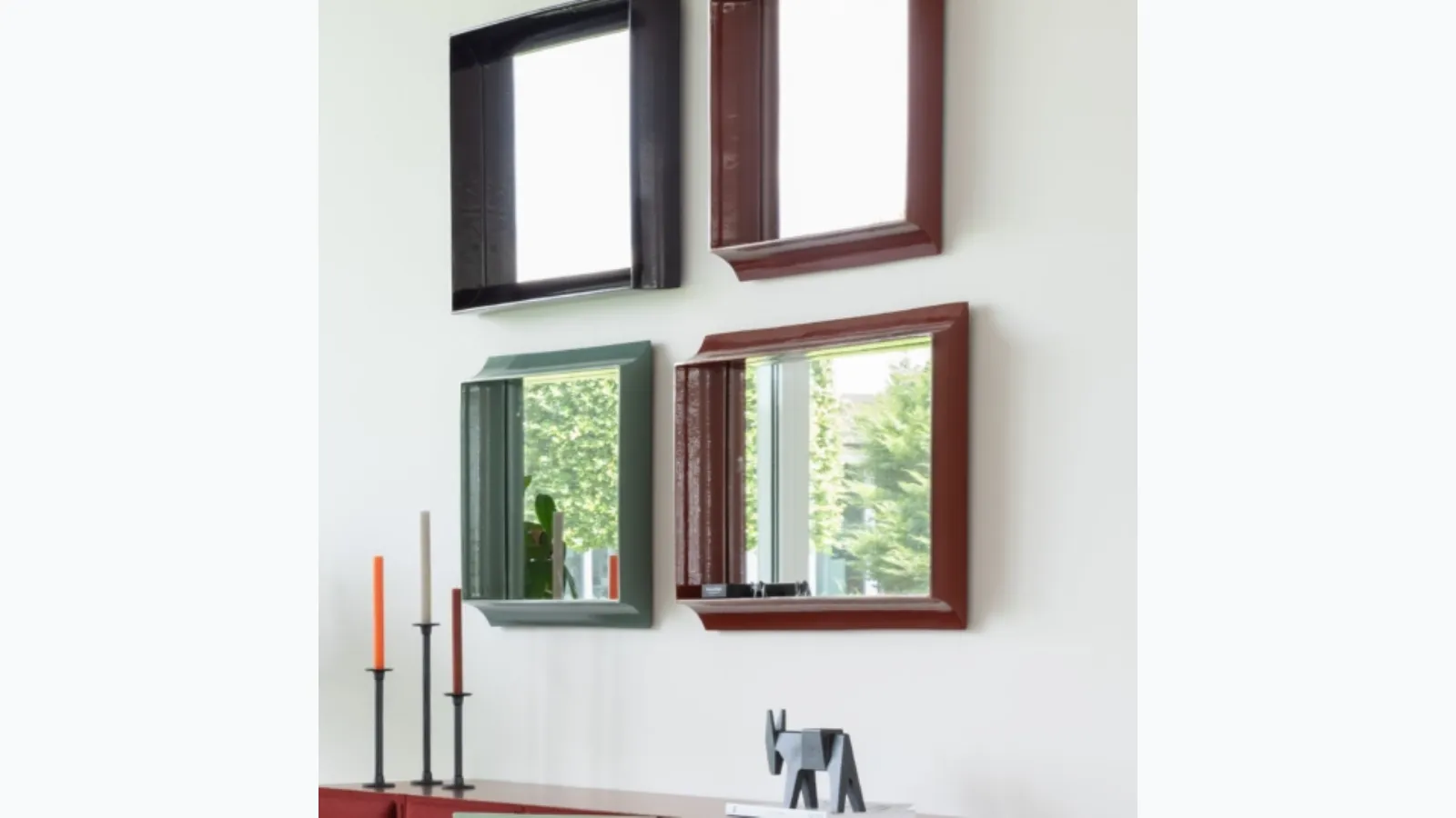 Coves mirror with ceramic frame by Magis.