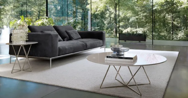 Round coffee table Dabliu-In in glossy lacquer with a metal rod structure by Desirèe.