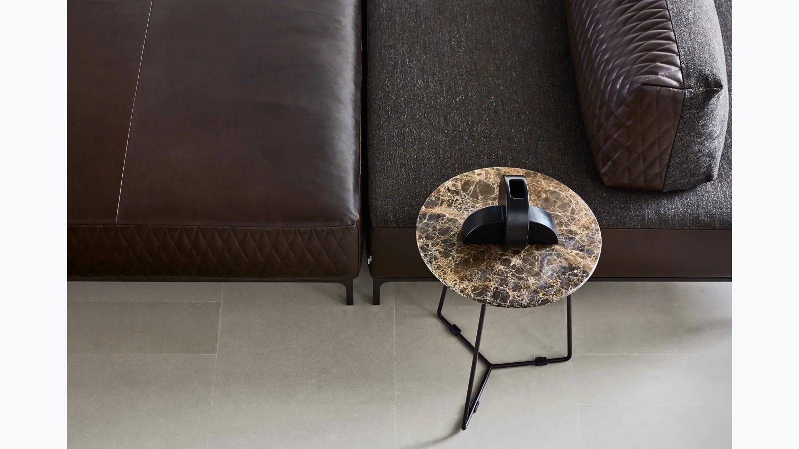 Round coffee table Kevin with marble top by Ditre Italia.
