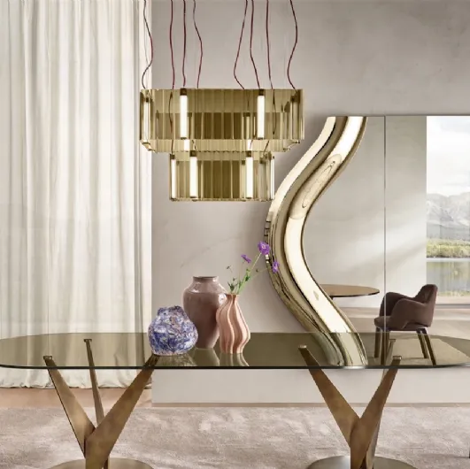 Magnificent mirror with a curved glass frame by Fiam.