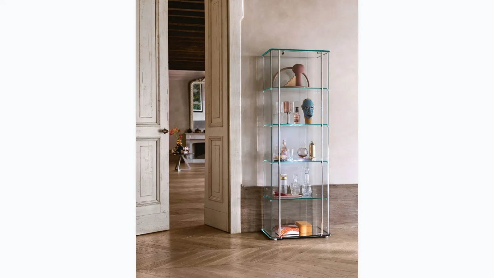 Milo Day glass display cabinet with curved glass and LED lighting by Fiam.