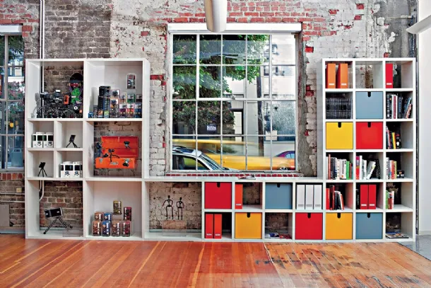 Modular plastic bookcase container by Kartell