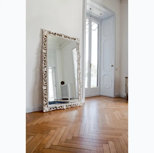 Large Agrip mirror with a floral frame in matte white lacquered wood by Tonin Casa.