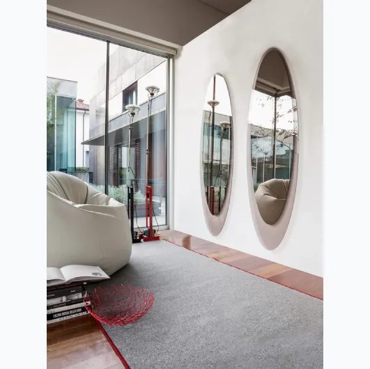 Elliptical Olmi mirror with transparent bronze glass frame by Tonin Casa.