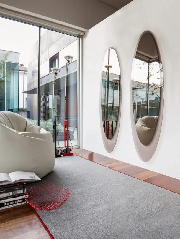 Elliptical Olmi mirror with transparent bronze glass frame by Tonin Casa.