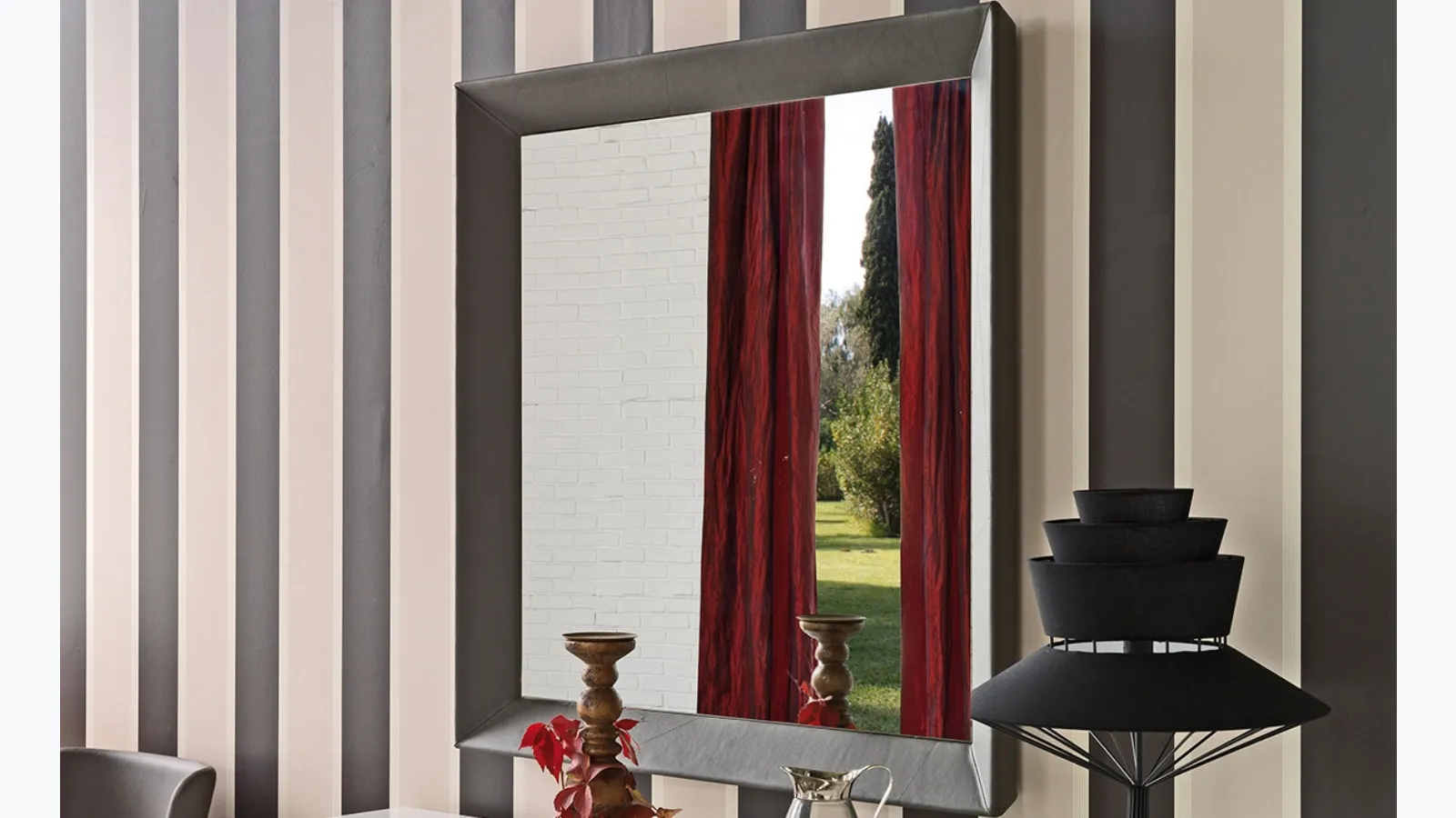Tuxedo mirror with frame covered in eco-leather by Cattelan Italia.