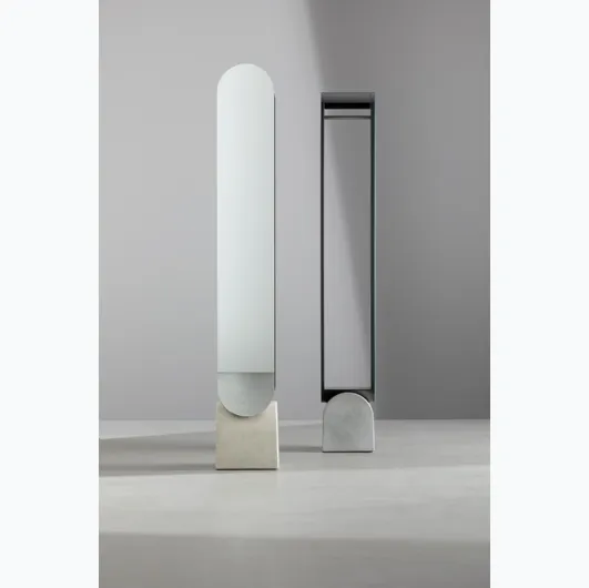 Vague Mirror by Bonaldo with metal frame and concrete base.