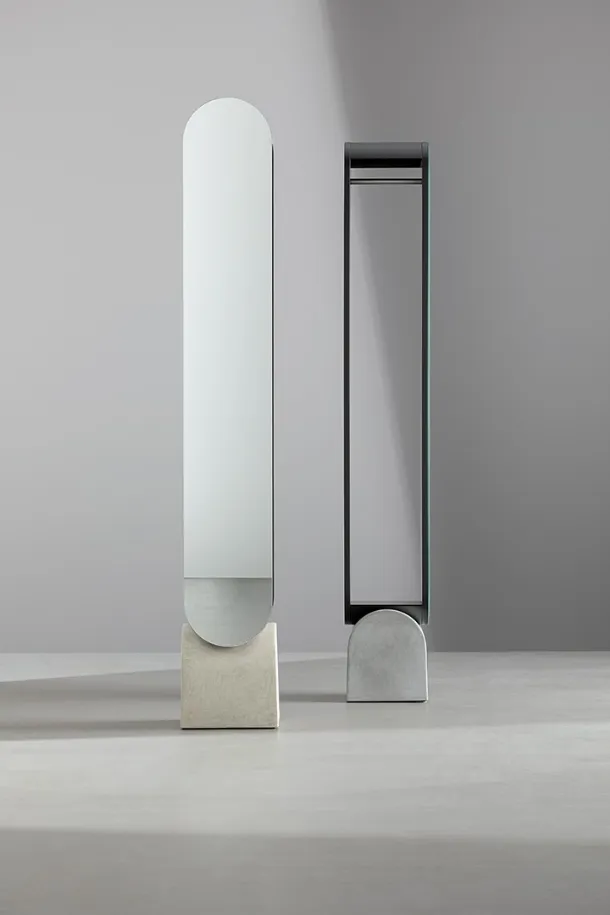 Vague Mirror by Bonaldo with metal frame and concrete base.