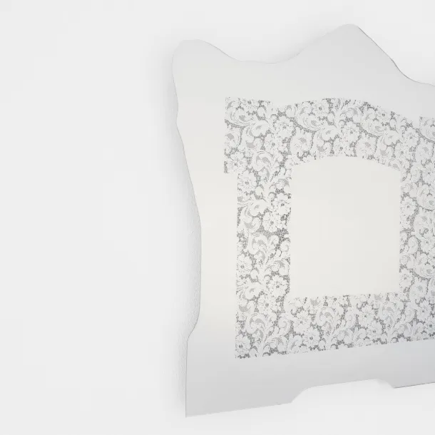 Spizzo mirror with lace insert reflecting Glas Italia mirror.
