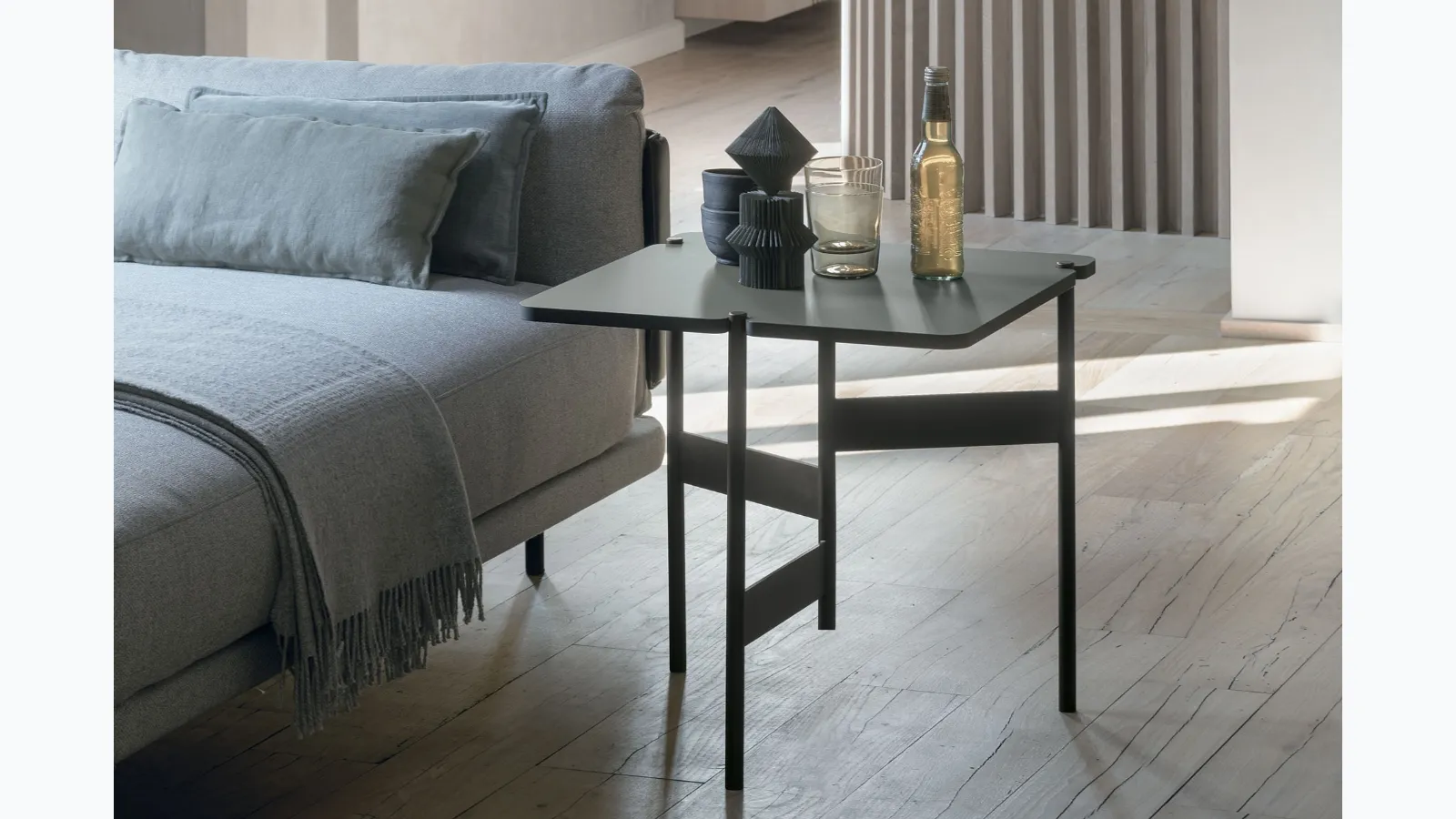 Square coffee table in basalt lacquered CDF by Tomasella.