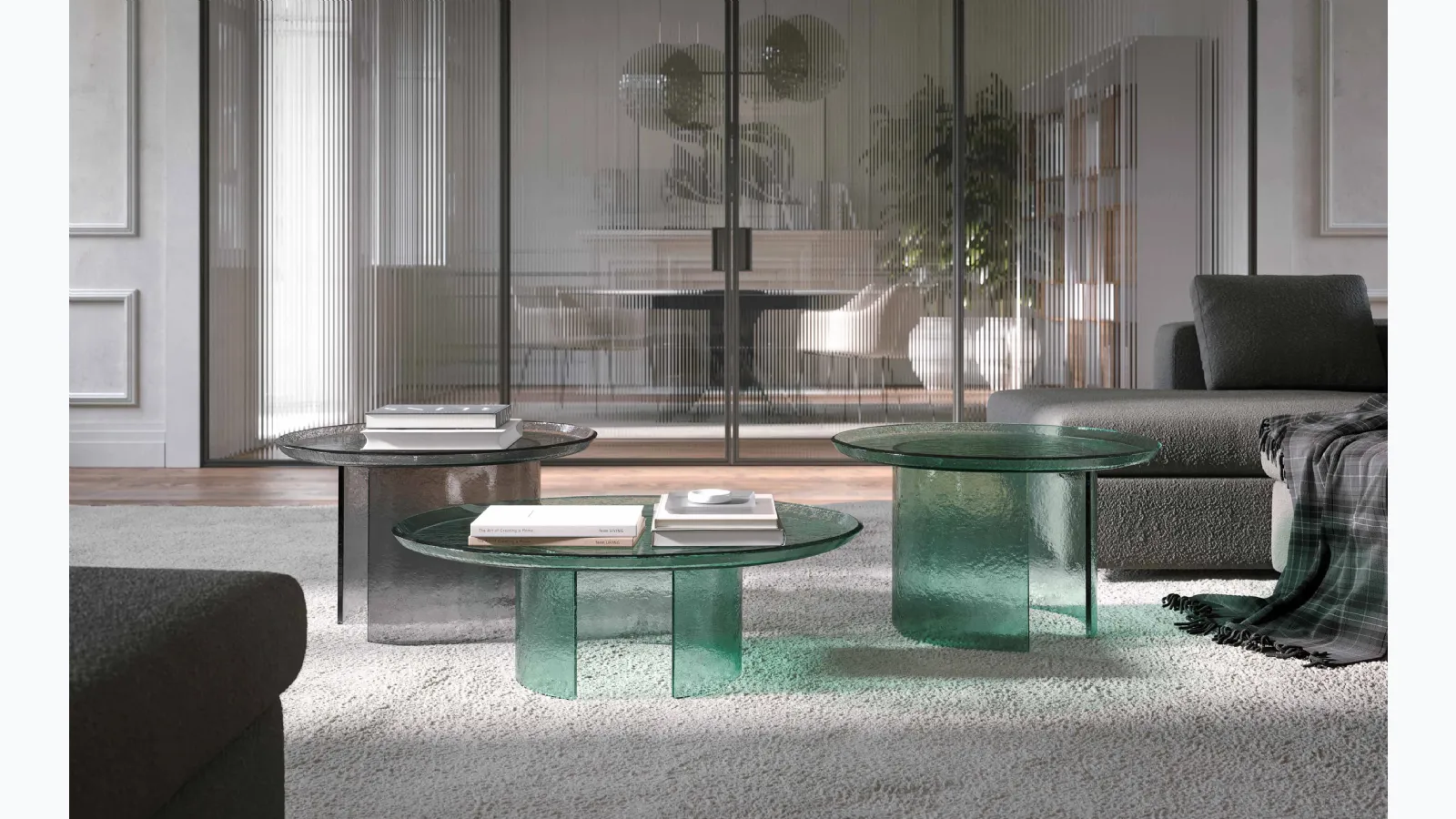 Atollo coffee table in hammered glass by Tonin Casa.