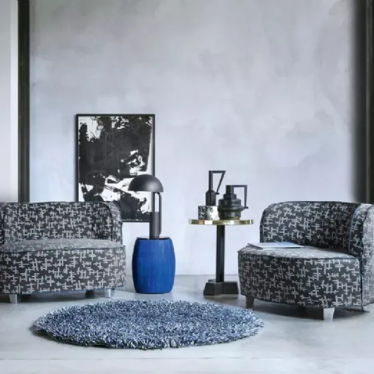 News coffee table in blue lacquered pressed paper with a Gervasoni MDF top.