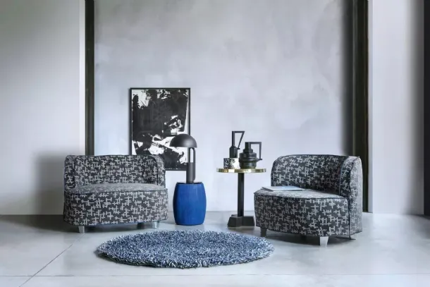 News coffee table in blue lacquered pressed paper with a Gervasoni MDF top.