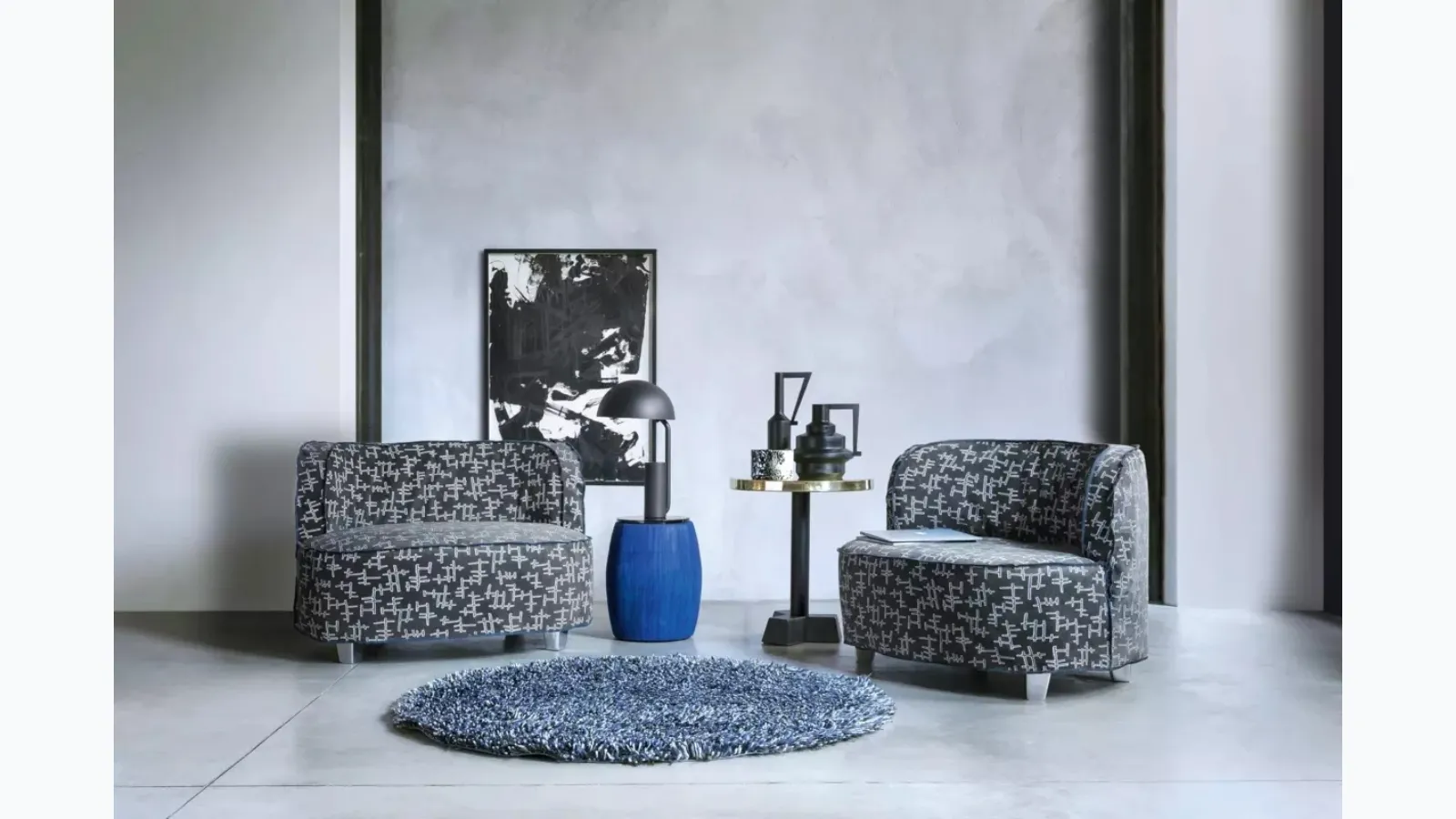 News coffee table in blue lacquered pressed paper with a Gervasoni MDF top.