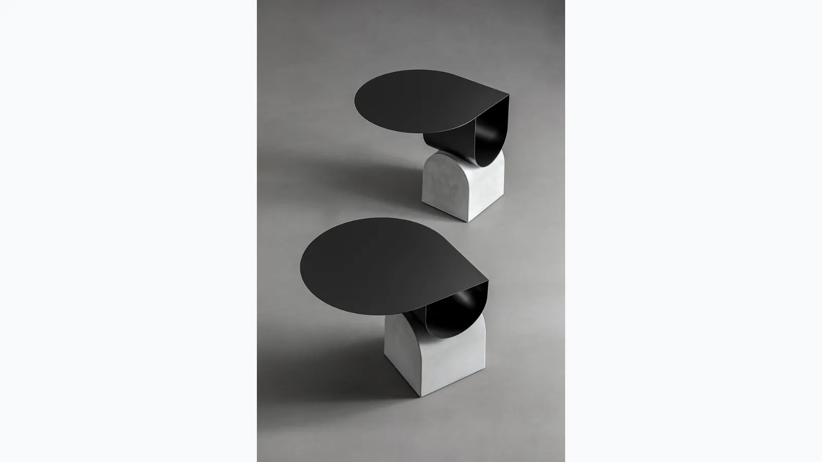 Vague coffee table by Bonaldo, made of metal with a concrete base.