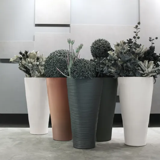 Adriani and Rossi's Metallic Cone Vase.
