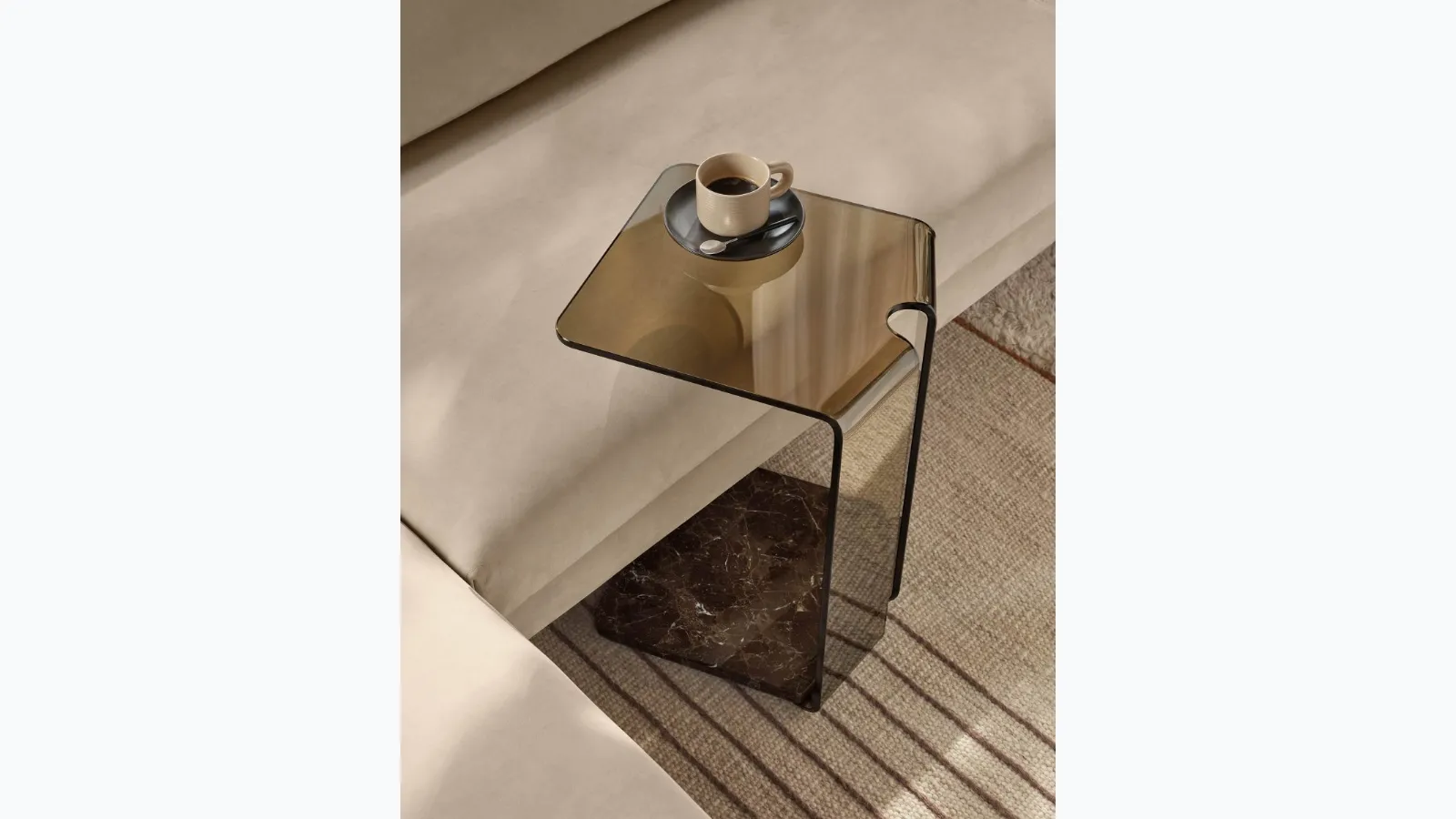 Glass coffee table with York marble base by Fiam.