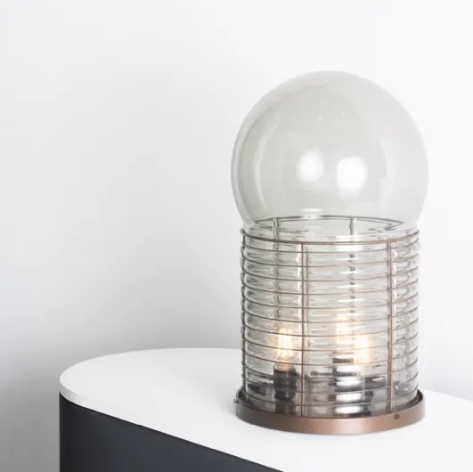 Alcinoo table lamp by Artemide.