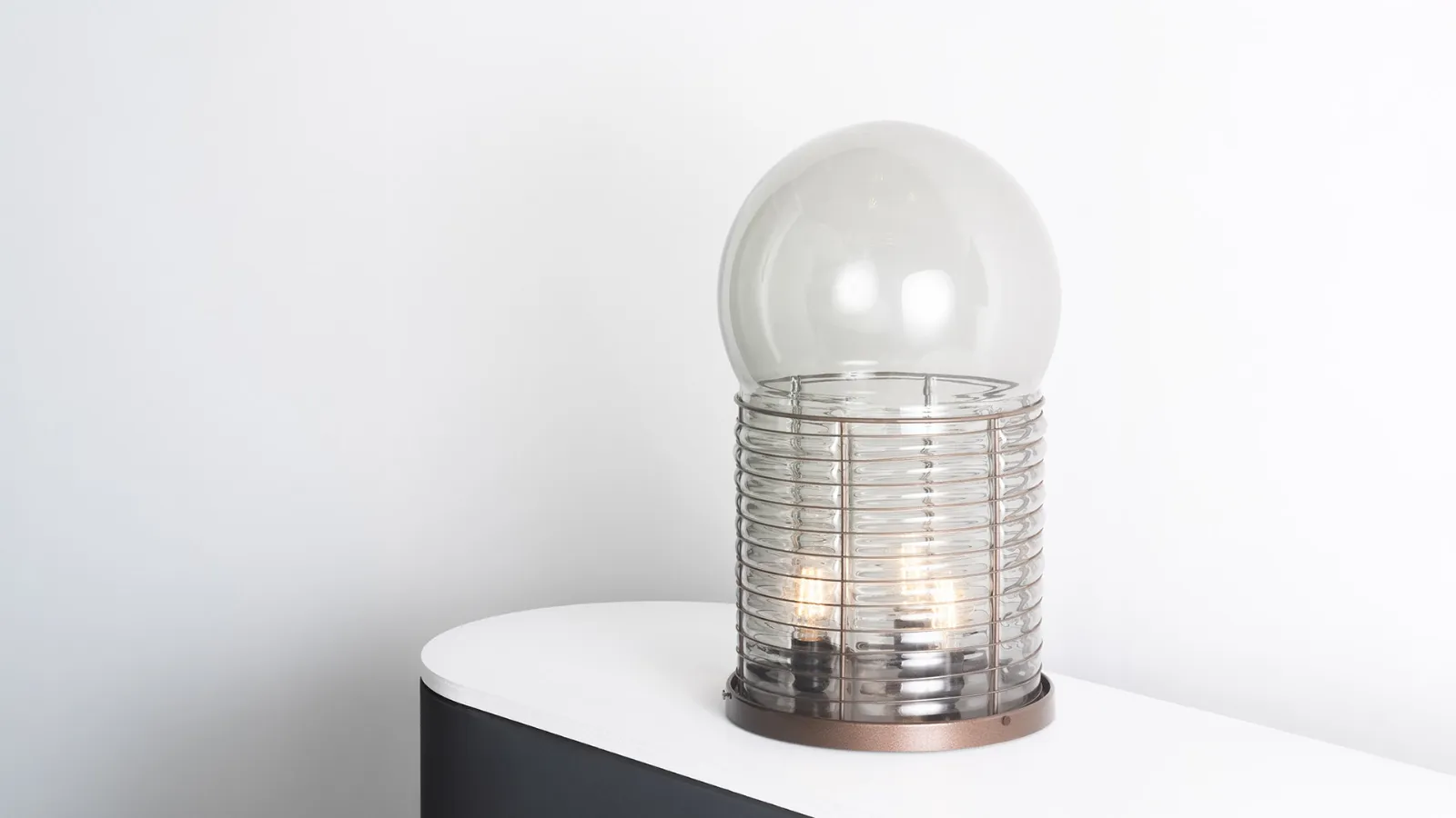 Alcinoo table lamp by Artemide.