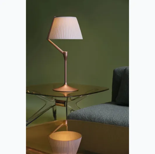 Angelo Stone table lamp in aluminum with diffuser covered in Kartell fabric.