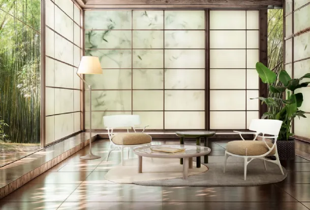 Angelo Stone floor lamp in aluminum with a diffuser covered in Kartell fabric.