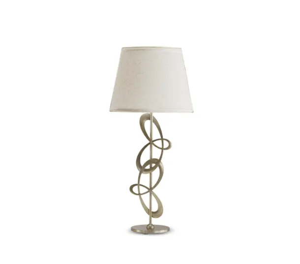 Decò flat iron table lamp with lampshade in Cantori fabric.