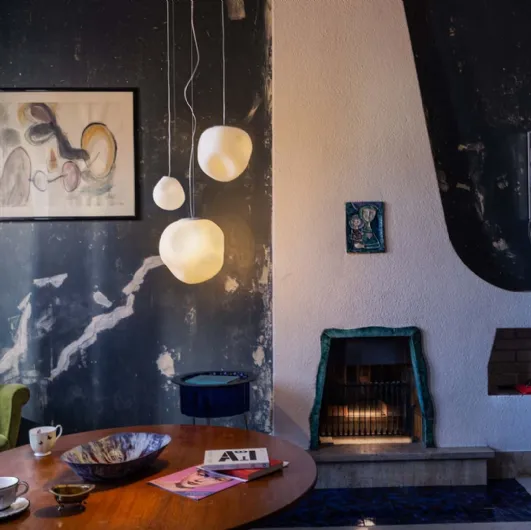 Hoba suspension lamp in irregular blown glass form by Foscarini.